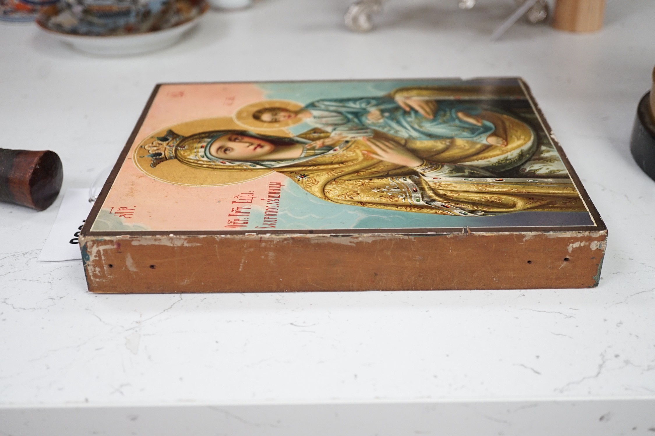 A Russian painted wood icon of Virgin and child, 22.5x18cm